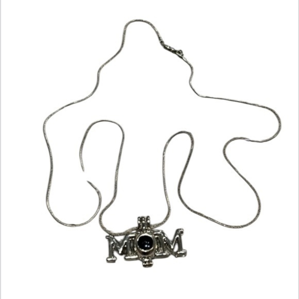 Genuine Pearl in a MOM Pearl cage with 24in chain